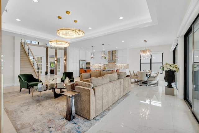17112 Aquavera Way, Boca Raton, FL 33496 - living area featuring a chandelier, a raised ceiling, recessed lighting, stairway, and light marble finish flooring