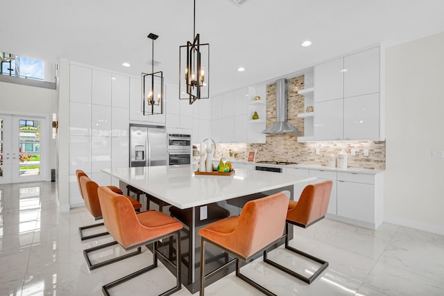 17112 Aquavera Way, Boca Raton, FL 33496 - dining room with light marble finish floors, baseboards, recessed lighting, and a chandelier