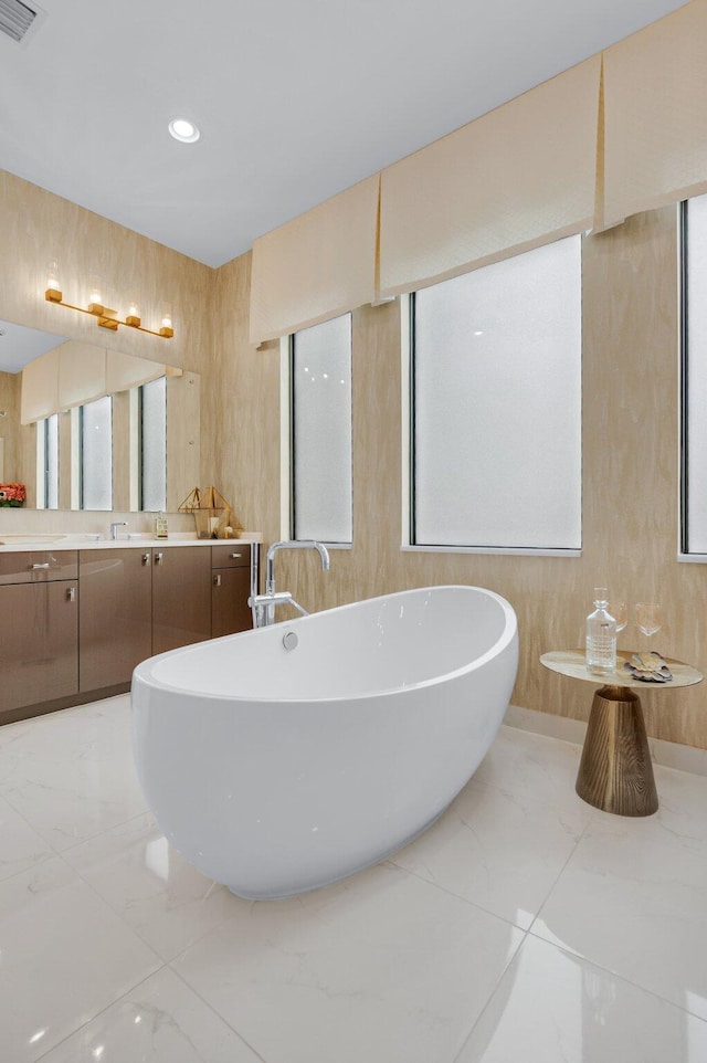 17112 Aquavera Way, Boca Raton, FL 33496 - bathroom with marble finish floors, a freestanding bath, and vanity