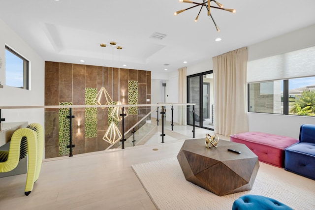 17112 Aquavera Way, Boca Raton, FL 33496 - hall featuring healthy amount of natural light, recessed lighting, wood finished floors, an upstairs landing, and a tray ceiling