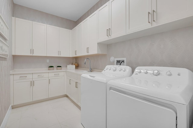 17112 Aquavera Way, Boca Raton, FL 33496 - laundry room with light marble finish flooring, washing machine and dryer, and cabinet space