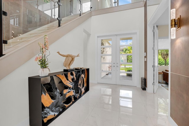 17112 Aquavera Way, Boca Raton, FL 33496 - foyer entrance with french doors, marble tiled flooring, and a towering ceiling