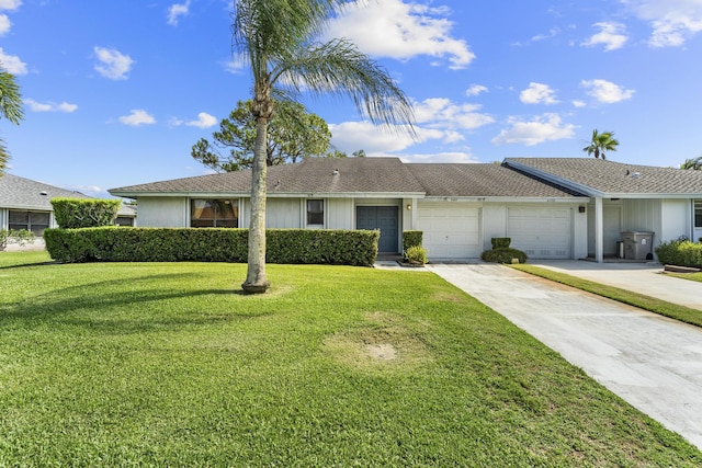 6166 Brandon St, Palm Beach Gardens, FL 33418 - single story home with a garage, a front lawn, and concrete driveway
