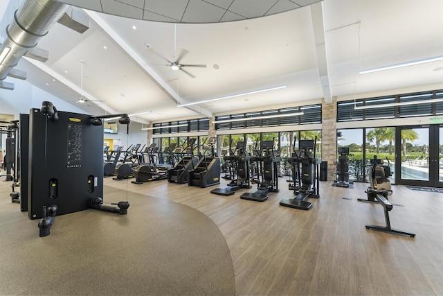 6166 Brandon St, Palm Beach Gardens, FL 33418 - gym featuring a ceiling fan, wood finished floors, and a high ceiling