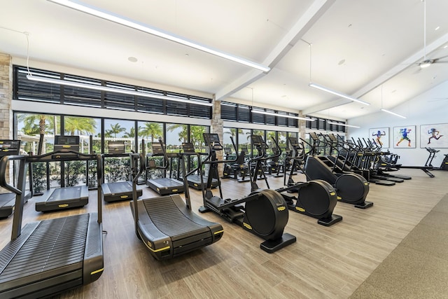 6166 Brandon St, Palm Beach Gardens, FL 33418 - workout area with high vaulted ceiling, wood finished floors, and beam ceiling