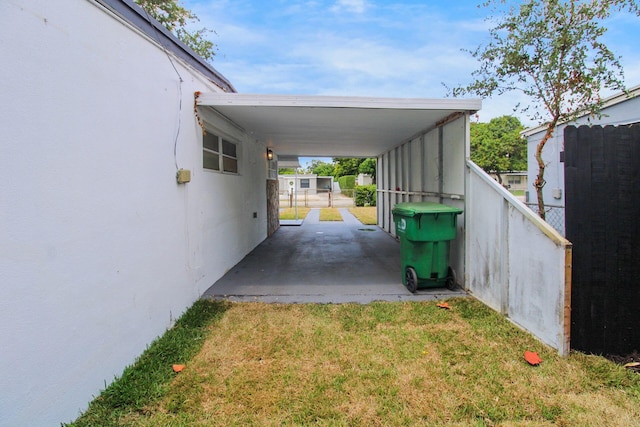 14215 NW 22nd Ct, Opa-Locka, FL 33054 - view of vehicle parking featuring an attached carport