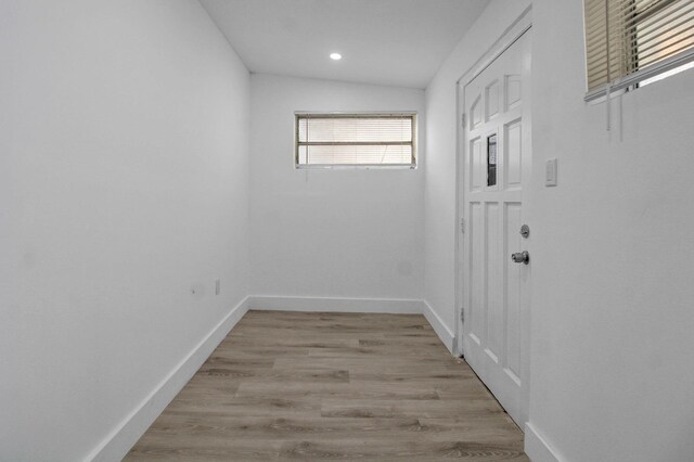 14215 NW 22nd Ct, Opa-Locka, FL 33054 - hallway featuring recessed lighting, baseboards, and light wood finished floors