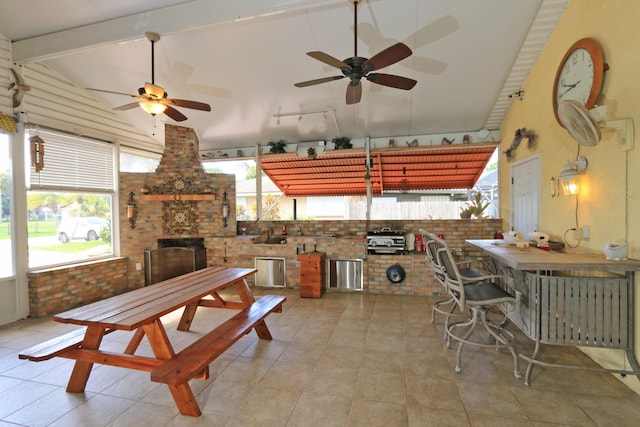 4811 Seagrape Dr, Fort Pierce, FL 34982 - view of patio / terrace with exterior kitchen, ceiling fan, outdoor dining area, and an outdoor bar