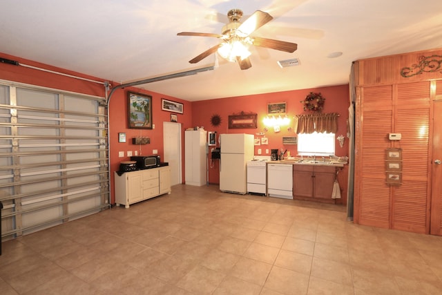 4811 Seagrape Dr, Fort Pierce, FL 34982 - kitchen with white appliances, a ceiling fan, and a sink