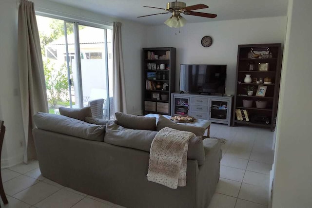 4097 Bluff Harbor Way, Wellington, FL 33449 - living area with light tile patterned floors and ceiling fan