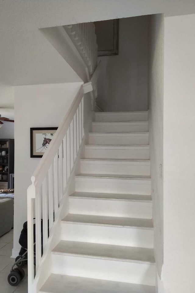 4097 Bluff Harbor Way, Wellington, FL 33449 - stairway featuring tile patterned floors and ceiling fan