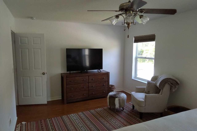 4097 Bluff Harbor Way, Wellington, FL 33449 - bedroom with wood finished floors, a ceiling fan, and baseboards