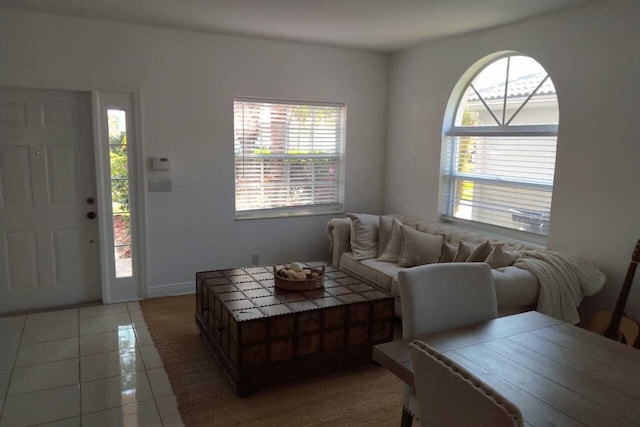 4097 Bluff Harbor Way, Wellington, FL 33449 - living area featuring light tile patterned flooring and baseboards