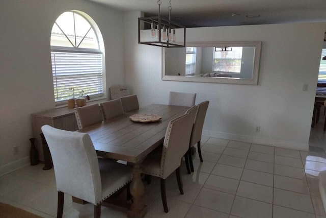 4097 Bluff Harbor Way, Wellington, FL 33449 - dining area featuring light tile patterned floors and baseboards