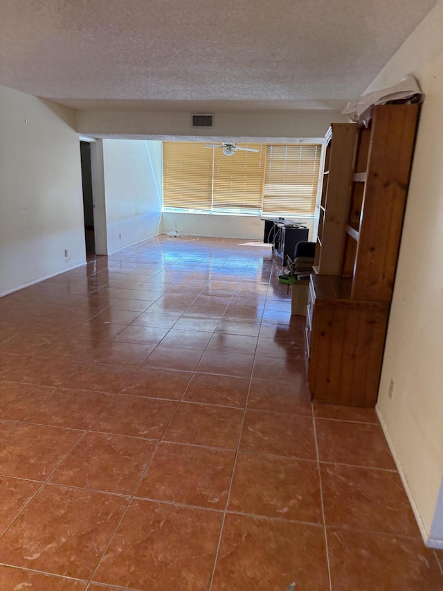 4145 Cypress Reach Ct Unit 503, Pompano Beach, FL 33069 - corridor featuring a textured ceiling and tile patterned flooring