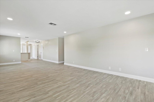 13921 Royal Palm Ct Unit D, Delray Beach, FL 33484 - spare room with light wood-type flooring, baseboards, and recessed lighting