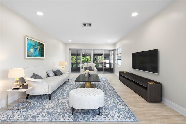 13921 Royal Palm Ct Unit D, Delray Beach, FL 33484 - living area with baseboards, light wood-style floors, and recessed lighting