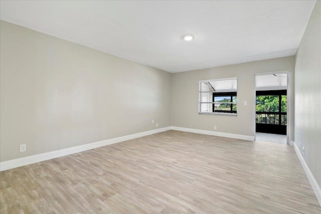 13921 Royal Palm Ct Unit D, Delray Beach, FL 33484 - empty room with light wood finished floors and baseboards