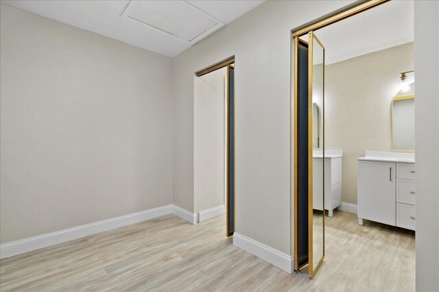 13921 Royal Palm Ct Unit D, Delray Beach, FL 33484 - unfurnished bedroom with light wood finished floors and baseboards