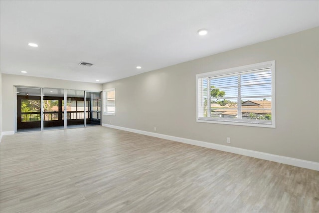 13921 Royal Palm Ct Unit D, Delray Beach, FL 33484 - empty room featuring baseboards, light wood finished floors, and recessed lighting
