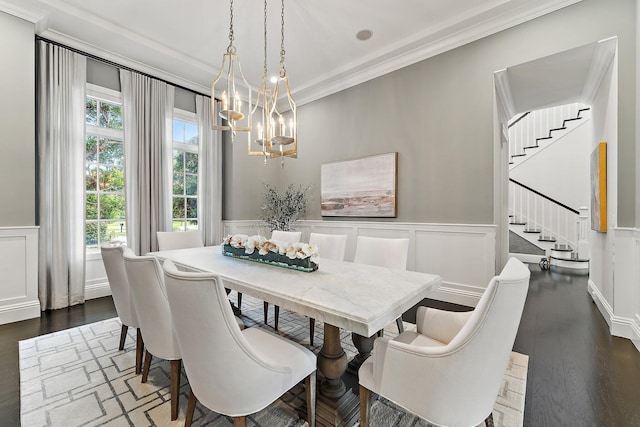 7703 Bold Lad Rd, Palm Beach Gardens, FL 33418 - dining space featuring stairs, a chandelier, ornamental molding, a decorative wall, and wainscoting