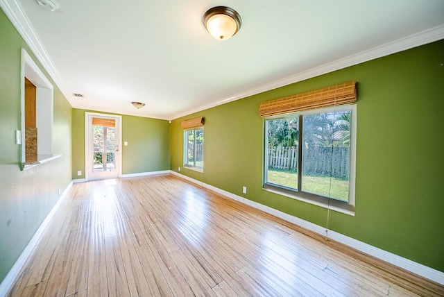 1950 N Conference Dr, Boca Raton, FL 33486 - unfurnished room featuring crown molding, baseboards, and wood finished floors