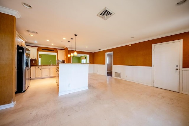 1950 N Conference Dr, Boca Raton, FL 33486 - kitchen with refrigerator with ice dispenser, a wainscoted wall, concrete floors, crown molding, and hanging light fixtures