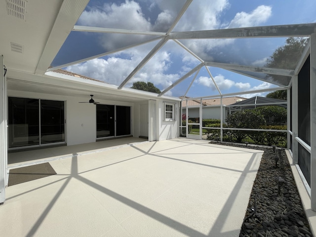 6503 Geminata Oak Ct, Palm Beach Gardens, FL 33410 - unfurnished sunroom with ceiling fan