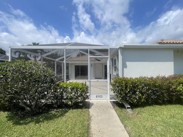 6503 Geminata Oak Ct, Palm Beach Gardens, FL 33410 - entrance to property with stucco siding