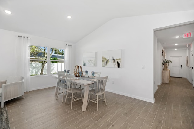 201 Ocarina St SW Unit 78, Palm Bay, FL 32908 - dining area featuring lofted ceiling, baseboards, light wood-type flooring, and recessed lighting