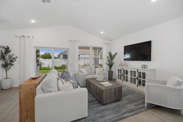 201 Ocarina St SW Unit 78, Palm Bay, FL 32908 - living area with vaulted ceiling, wood finished floors, and recessed lighting