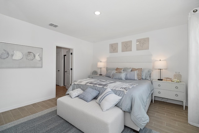 201 Ocarina St SW Unit 78, Palm Bay, FL 32908 - bedroom with wood tiled floors and baseboards