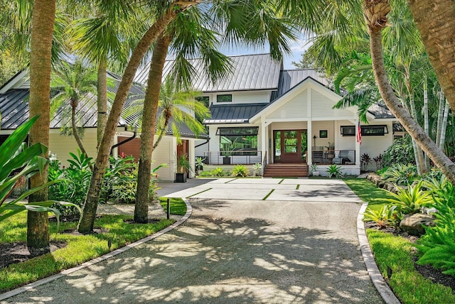 5488 Pennock Point Rd, Jupiter, FL 33458 - view of front of property with driveway and covered porch