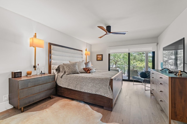 5488 Pennock Point Rd, Jupiter, FL 33458 - bedroom with access to exterior, light wood-type flooring, and ceiling fan