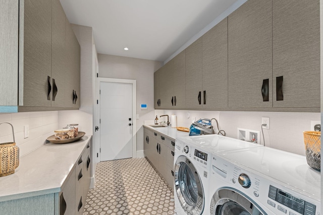 5488 Pennock Point Rd, Jupiter, FL 33458 - laundry area with washing machine and clothes dryer and cabinet space