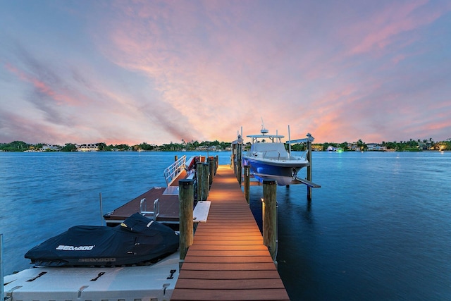 5488 Pennock Point Rd, Jupiter, FL 33458 - dock area featuring boat lift and a water view