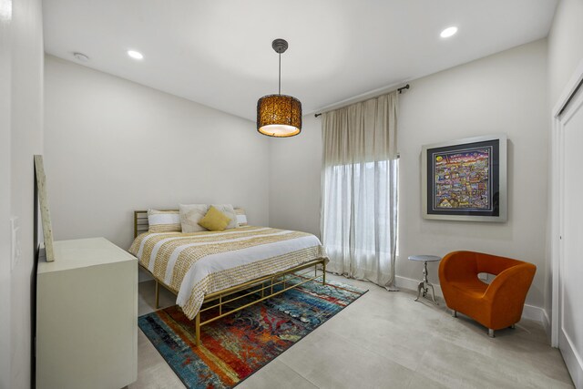 7802 Martin Ave, West Palm Beach, FL 33405 - bedroom featuring recessed lighting, baseboards, a ceiling fan, and connected bathroom