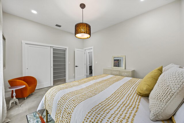 7802 Martin Ave, West Palm Beach, FL 33405 - full bathroom featuring a marble finish shower, double vanity, a soaking tub, and tile walls