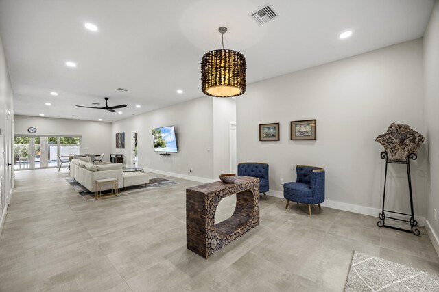 7802 Martin Ave, West Palm Beach, FL 33405 - living area featuring recessed lighting, a ceiling fan, baseboards, concrete floors, and french doors