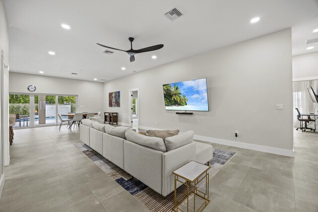 7802 Martin Ave, West Palm Beach, FL 33405 - living room featuring recessed lighting and baseboards