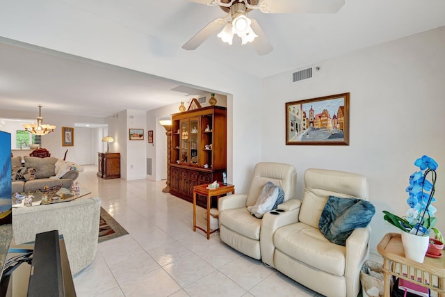 5746 Crystal Shores Dr Unit 206, Boynton Beach, FL 33437 - living area featuring a chandelier, light tile patterned floors, and ceiling fan