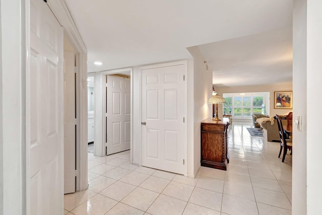 5746 Crystal Shores Dr Unit 206, Boynton Beach, FL 33437 - corridor with light tile patterned floors and baseboards