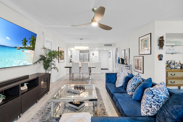 6699 NW 2nd Ave Unit 109, Boca Raton, FL 33487 - living room with light wood-type flooring and ceiling fan