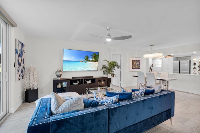 6699 NW 2nd Ave Unit 109, Boca Raton, FL 33487 - living room featuring wood finished floors and ceiling fan