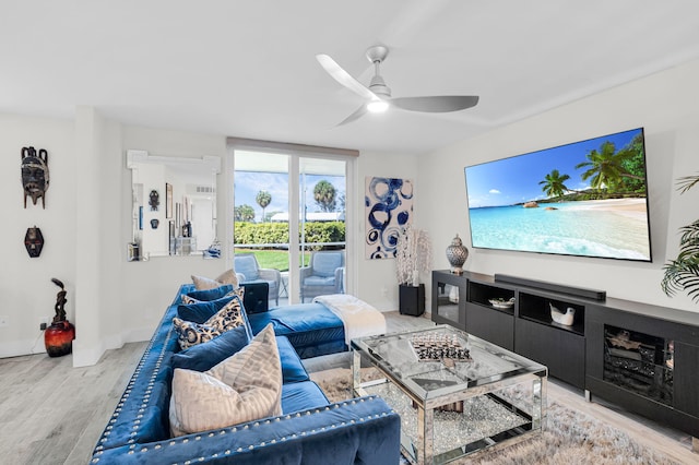 6699 NW 2nd Ave Unit 109, Boca Raton, FL 33487 - living area featuring light wood-type flooring and a ceiling fan