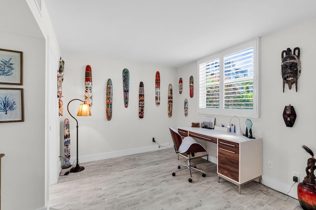 6699 NW 2nd Ave Unit 109, Boca Raton, FL 33487 - office with light wood-style flooring and baseboards