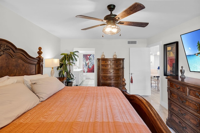 6699 NW 2nd Ave Unit 109, Boca Raton, FL 33487 - bedroom with ensuite bath and ceiling fan