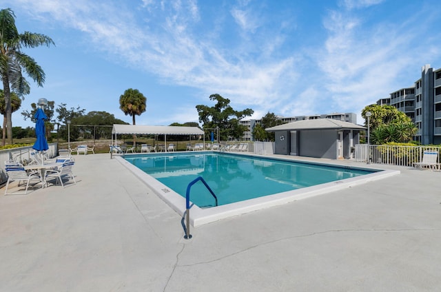6699 NW 2nd Ave Unit 109, Boca Raton, FL 33487 - community pool featuring a patio area
