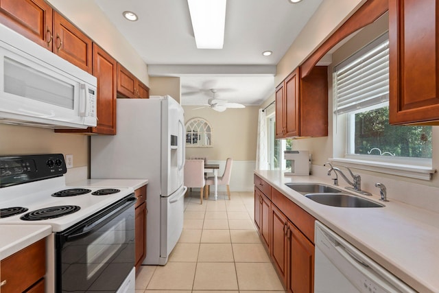 6503 SE Lillian Ct, Stuart, FL 34997 - kitchen with white appliances, a sink, light countertops, ceiling fan, and recessed lighting