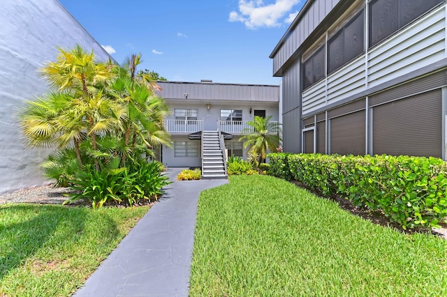 7 Normandy Unit A, Delray Beach, FL 33484 - view of property's community with stairs and a yard